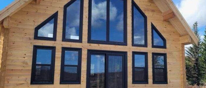Dow and Duggan log home window wall